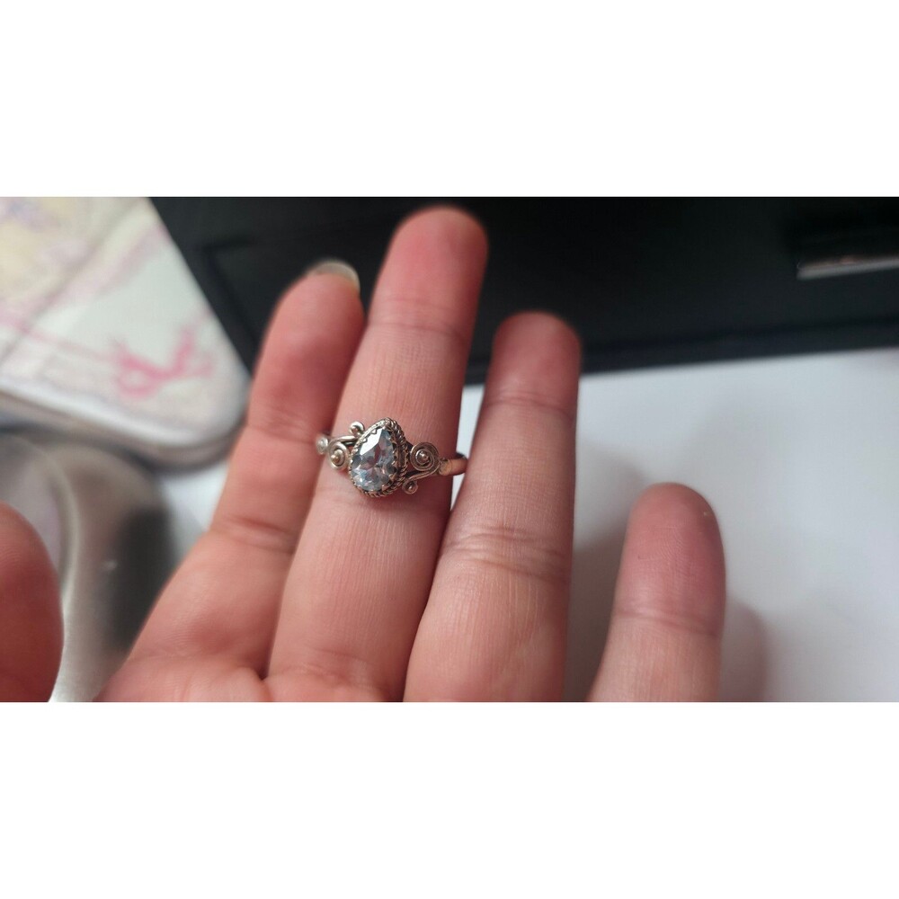 Blue topaz, silver ring with filigree